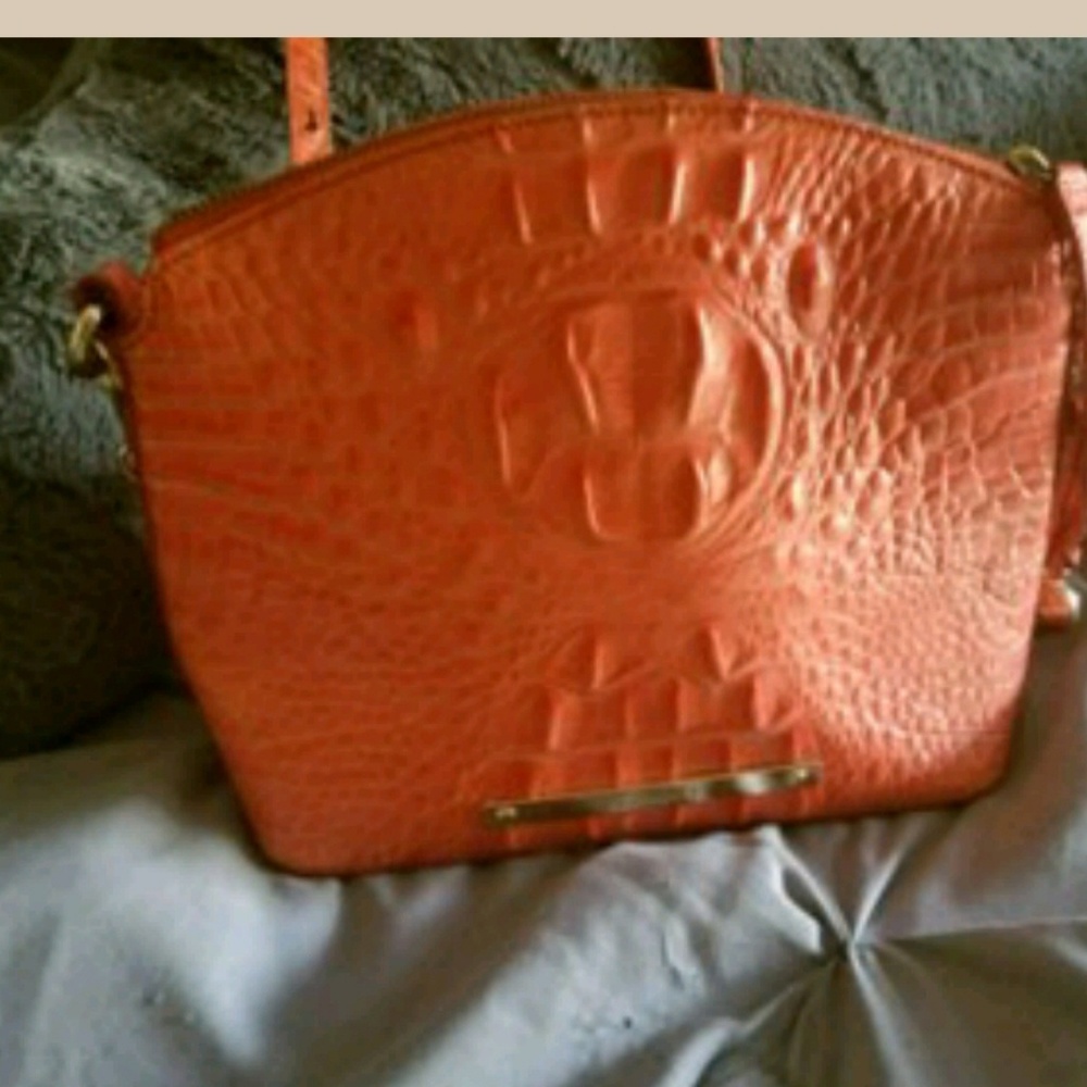 Salmon colored crossover purse